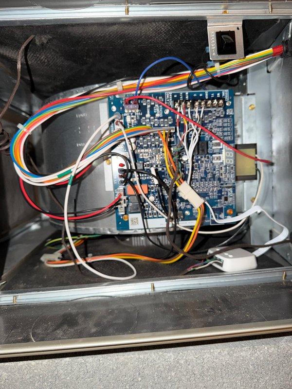 Performed routine HVAC maintenance agreement service on system with two condensers. Inspected control board and electrical connections within the unit, verifying proper wiring harness connections and component operation. Replaced two air filters: one 16x25x1 and one 14x25x1, removing old filters and installing new pleated media filters to maintain proper airflow and system efficiency.