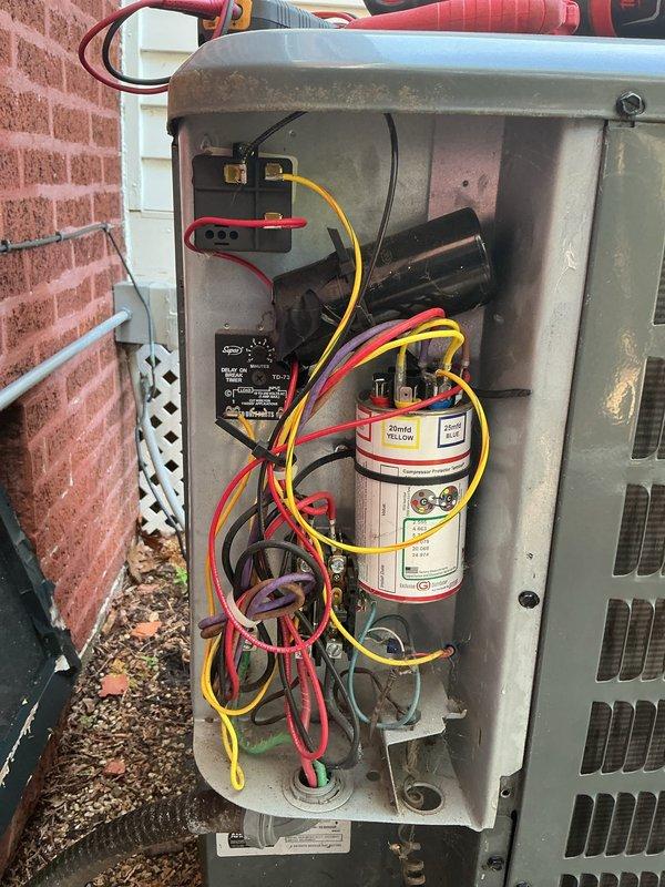 Completed comprehensive maintenance agreement service on two Mitsubishi Electric condensing units. Performed electrical diagnostics using multimeter to verify system performance, tested capacitor functionality, and inspected all electrical connections and components. Cleaned condenser coils, verified proper operation of both outdoor units, and replaced 14x30x1 air filter as part of routine maintenance protocol.
