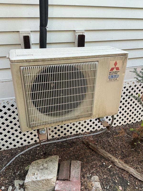 Completed comprehensive maintenance agreement service on two Mitsubishi Electric condensing units. Performed electrical diagnostics using multimeter to verify system performance, tested capacitor functionality, and inspected all electrical connections and components. Cleaned condenser coils, verified proper operation of both outdoor units, and replaced 14x30x1 air filter as part of routine maintenance protocol.
