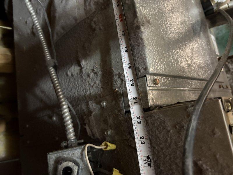 Conducted on-site assessment of two 23-year-old air conditioning units serving a two-zone residential system for replacement quote preparation. Documented existing equipment configuration, ductwork conditions, and installation environment through photographic documentation showing aged flexible ductwork with visible wear, existing air handler components with louvered panels, and exposed mechanical infrastructure in unfinished utility space. Confirmed property ownership and verified account information for estimate processing.