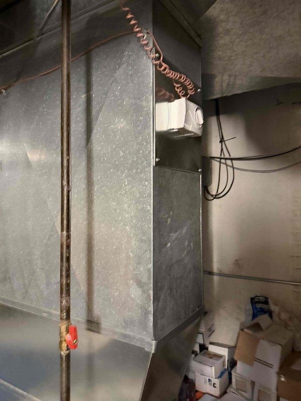 Conducted comprehensive HVAC estimate for replacement of 18-year-old residential air conditioning system. Evaluated existing York brand furnace and air handler configuration in basement utility room, documenting current ductwork connections, refrigerant lines, electrical components, and condensate drainage system. Photographed equipment dimensions and existing infrastructure to determine replacement unit specifications and installation requirements for complete system upgrade.