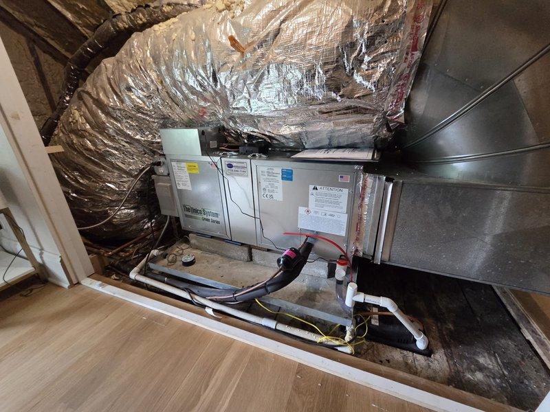 Completed warranty installation of new ecobee smart thermostat. Removed existing thermostat, properly terminated and labeled all HVAC wiring connections including Rc, Rh, W1, W2, and accessory wires to corresponding terminals on ecobee baseplate, mounted unit to wall, and verified system communication with air handler unit located in attic space.