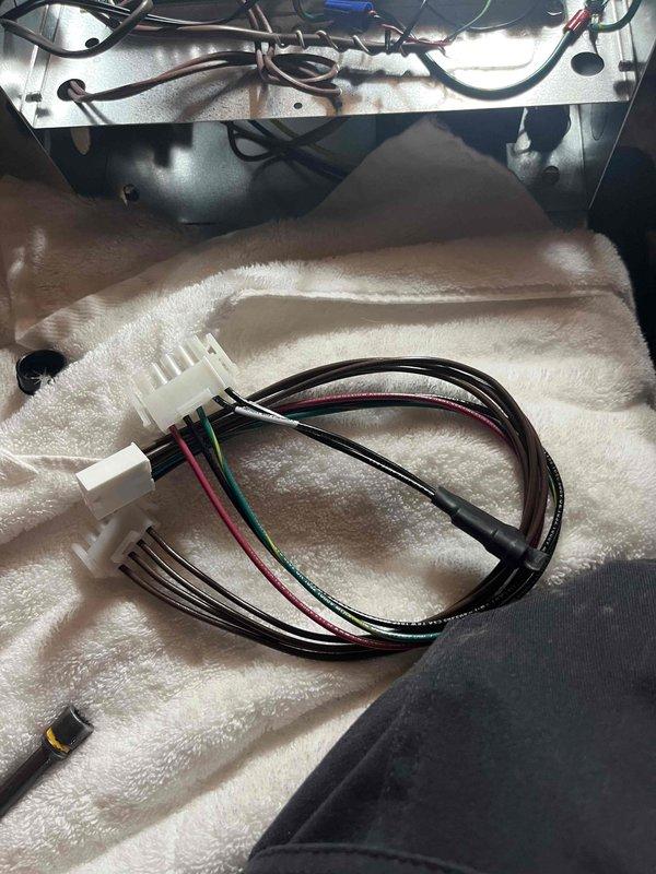 Returned to complete control board replacement on Unico system. Disconnected existing wire harnesses from failed control board, removed old board from enclosure, and installed new replacement control board. Reconnected all wire harnesses including multi-pin connectors to appropriate terminals, verified proper connections for all colored wiring, and tested system operation to confirm successful repair.