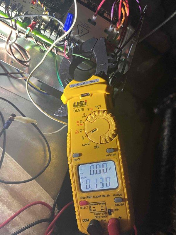 Responded to callback for AC blowing warm air with continuously running fan following previous repair. Upon arrival, accessed outdoor unit and performed diagnostic testing on control board and electrical system using clamp meter to verify amperage draws and system operation. Inspected circuit board components, wiring connections, and control sequences to identify root cause of malfunction. Documented findings with photos of control board assembly and electrical measurements for warranty and quality assurance purposes.