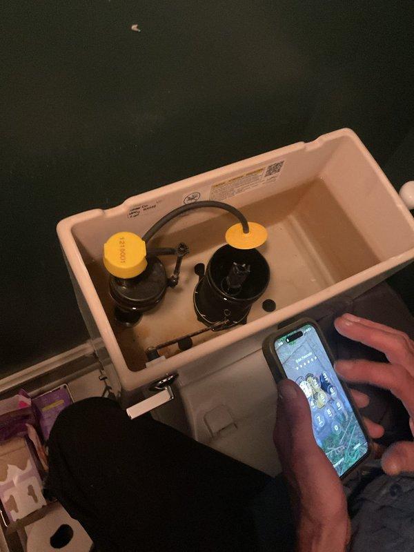 Responded to service call for non-functioning toilet flushing mechanism. Upon inspection, accessed toilet tank and diagnosed faulty flush valve assembly. Replaced complete flush valve mechanism including flapper, chain, and overflow tube. Adjusted fill valve water level and tested flushing operation to ensure proper function and complete bowl clearance.