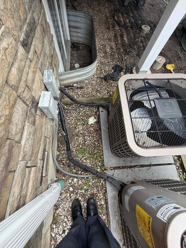 Performed routine maintenance inspection on residential HVAC system under preventative maintenance agreement. Inspected outdoor condensing unit, verified proper operation of fan assembly and blower wheel, checked refrigerant lines and electrical connections, and documented system condition with photographs. All components found to be in satisfactory working order with no immediate service needs identified.