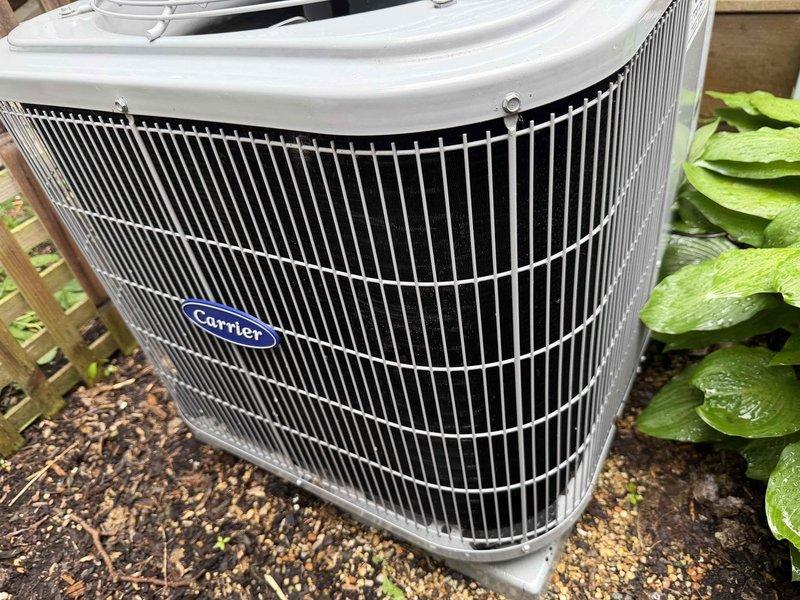 Completed preventive maintenance agreement service on two Carrier air conditioning systems. Performed comprehensive inspection of outdoor condensing units, verified electrical disconnect operation and connections, checked refrigerant levels, and inspected condenser coil condition. Replaced 16x25x1 air filters per agreement specifications, with 16x25x4 media filter scheduled for fall service.
