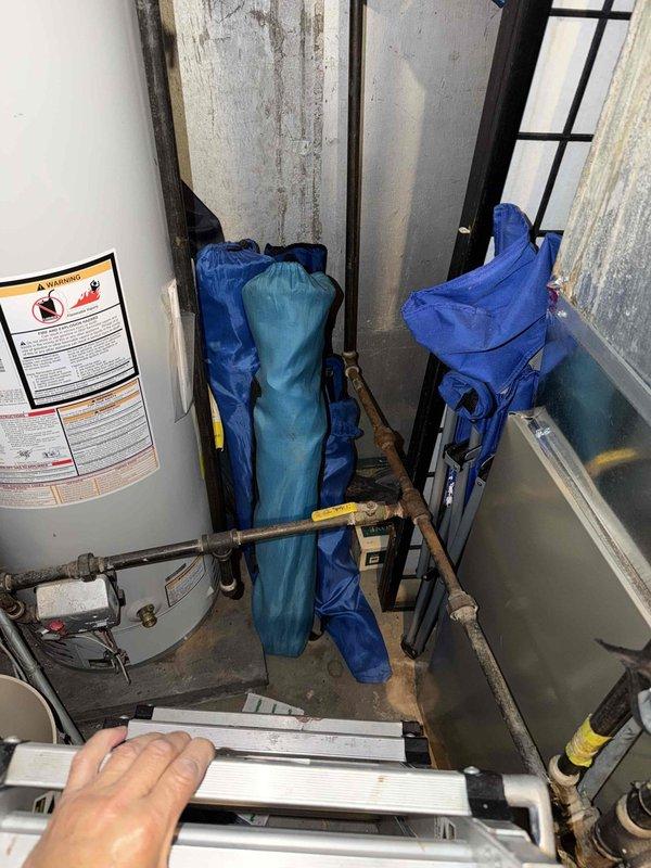Responded to gas odor call back following utility company shutoff. Performed comprehensive inspection of HVAC system gas connections and piping in mechanical room. Checked all gas line connections, valves, and fittings for leaks using approved detection methods. Verified proper installation of gas supply lines to furnace unit, inspected yellow brass valve connections and copper piping runs. Confirmed all connections were secure and properly sealed. Coordinated with gas utility for system re-pressurization and final clearance to restore service.