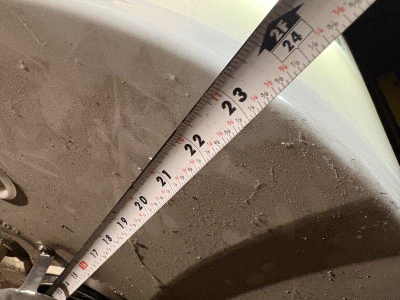Performed on-site assessment of existing water heater in basement for replacement estimate. Documented current installation conditions including clearances, venting configuration, and access points. Measured existing water heater dimensions and surrounding workspace to determine appropriate replacement unit specifications and verify compatibility with current plumbing connections and electrical or gas supply lines.