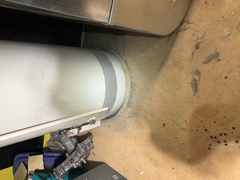 Performed on-site assessment of existing water heater in basement for replacement estimate. Documented current installation conditions including clearances, venting configuration, and access points. Measured existing water heater dimensions and surrounding workspace to determine appropriate replacement unit specifications and verify compatibility with current plumbing connections and electrical or gas supply lines.