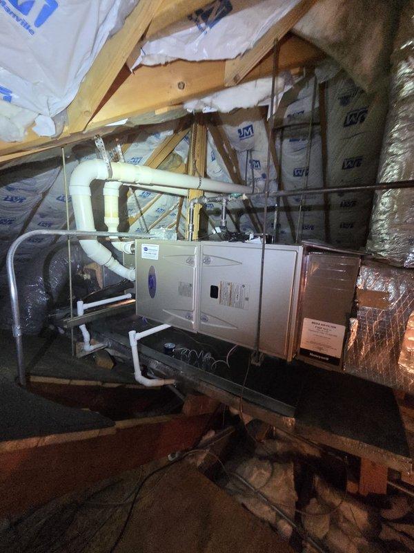 Responded to callback regarding humidity concerns following recent HVAC installation. Performed thorough inspection of attic-mounted air handler unit and associated ductwork to verify proper system operation and installation quality. Examined flexible duct runs, insulation placement, condensate drainage system, and equipment mounting to ensure all components were installed per manufacturer specifications and operating correctly to maintain proper humidity control throughout the home.
