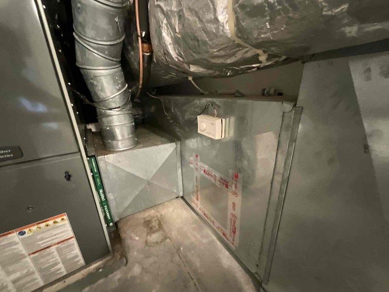 Performed comprehensive HVAC system evaluation on second floor left unit. Diagnosed low refrigerant levels in AC condenser and identified failed electrical components requiring complete electrical rebuild of condenser unit. Assessed aging furnace system determined to be over 10 years old and nearing end of serviceable life. Documented interior components and system conditions through detailed photography for estimate preparation. Scheduled follow-up installation appointment for full system replacement to address multiple component failures and aging equipment.