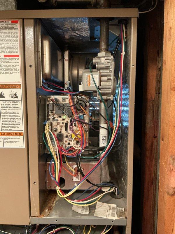 Responded to no cooling complaint on residential HVAC system. Upon arrival, confirmed unit was blowing warm air when thermostat set to cooling mode with display reading 91°F. Inspected indoor air handler components including blower motor, control board, and electrical connections, all of which appeared properly wired and in functional condition. Based on initial assessment of indoor unit showing no obvious electrical faults or mechanical issues, further diagnostic testing of outdoor condensing unit and refrigerant system would be required to isolate root cause of cooling failure.