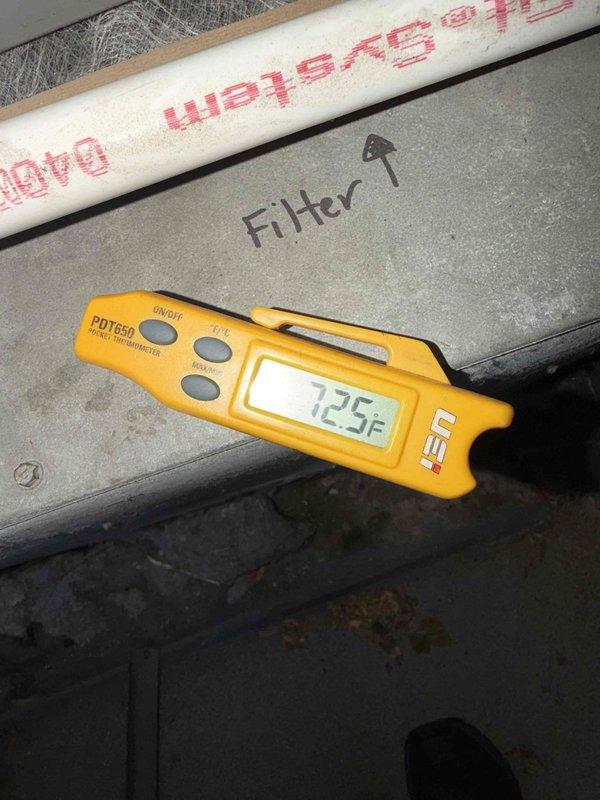 Completed comprehensive air conditioning maintenance agreement inspection including condenser coil examination, blower motor and wheel assessment revealing moderate dust accumulation on blower assembly, and indoor relative humidity testing at filter location registering 72.5°F. Verified refrigerant levels, cycled operating controls, inspected line voltage switch and wiring connections, confirmed proper condensate drainage, and examined refrigerant lines for leaks and insulation integrity. Installed 18x20x1 filter and documented all system components operating within normal parameters.