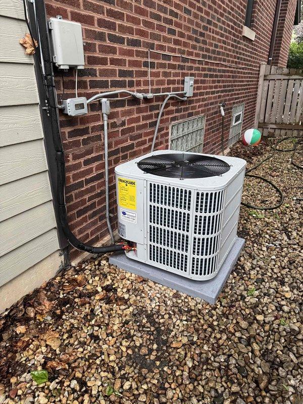 # HVAC Install - Complete System

## Summary
Successfully completed full HVAC system replacement including Unico high-velocity air conditioning system, outdoor condensing unit, and water heater over a two-day installation period with a three-person crew.

## Work Performed

Removed existing Unico high-velocity air conditioning system and all associated components. Disconnected and properly disposed of old outdoor condensing unit and water heater in accordance with environmental regulations.

Installed new outdoor condensing unit on existing concrete pad against exterior brick wall. Positioned unit for optimal airflow and service access. Secured unit to pad and ensured level installation for proper operation and drainage.

Routed new refrigerant line sets from outdoor unit to indoor air handler using white PVC line hide for clean exterior appearance. Lines run vertically along brick wall with proper support and protection from elements. Installed new electrical disconnect box and ran bl
