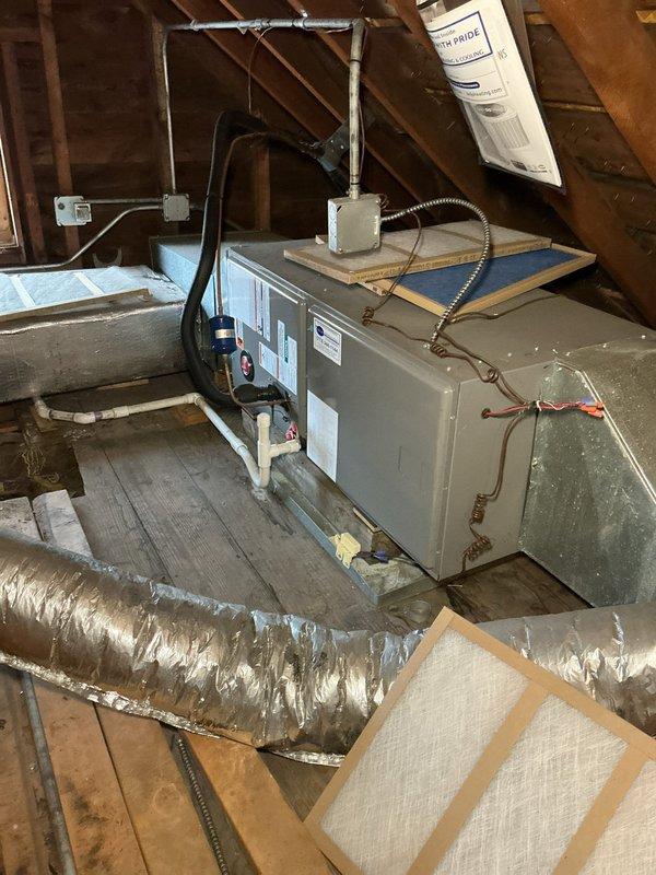 Completed commercial HVAC maintenance agreement service on two condenser units and associated air handlers. Accessed attic space via interior hallway to perform routine maintenance on air handling equipment. Replaced 16x20x1 air filters on both systems as part of scheduled preventive maintenance. Inspected air handler units, ductwork connections, electrical components, and condensate systems. All equipment found operating within normal parameters with no deficiencies noted at time of service.