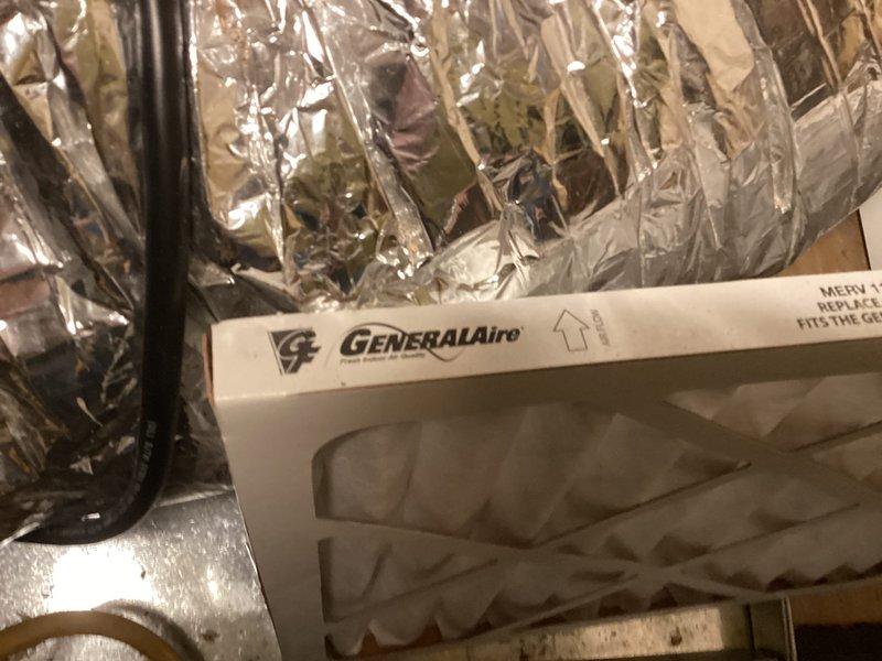 Responded to service call for non-operational dehumidifier system. Performed diagnostic inspection of the humidification equipment and associated ductwork installation. Inspected GeneralAire filter assembly and flexible ductwork routing throughout the mechanical space. Documented system conditions with photographic evidence showing filter location, duct configuration, and installation environment. Discussed coverage options for humidification equipment service with customer.