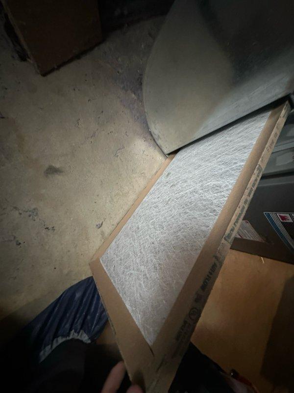 Responded to no cooling call on 5-year-old residential air conditioning system affecting entire home. Upon inspection, discovered severely restricted airflow due to heavily clogged air filter. Removed and replaced dirty filter with new unit, restoring proper system operation. Verified supply air temperature of 73.7°F at ductwork and confirmed adequate cooling performance throughout home.