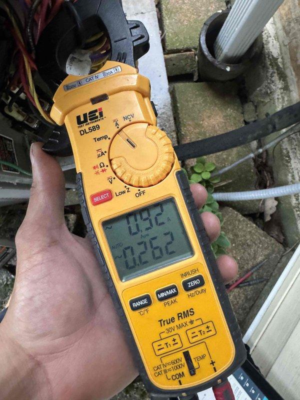 Returned to property to complete outdoor maintenance on residential air conditioning system. Performed thorough coil cleaning of condenser unit using pressure washing equipment to remove accumulated dirt and debris from exterior fins. Verified electrical readings using digital clamp meter, recording amperage draw of 1.92 amps and secondary reading of 0.262. All electrical connections and conduit inspected and found secure. Unit operating within normal parameters following maintenance completion.
