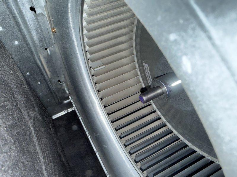 Performed preventive maintenance inspection on multi-condenser HVAC system under agreement terms. Inspected blower wheel assembly, verified proper operation and cleanliness of centrifugal fan components, and documented normal condition of evaporator coil with expected condensation present during cooling operation. Temperature measurements confirmed system operating within manufacturer specifications.