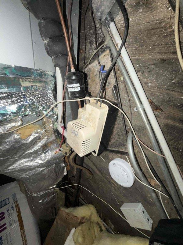 Replaced failed condensate pump in attic air handler to restore proper drainage and prevent water damage. Installed SureProtector device and wet coil coating system to enhance equipment protection and extend system longevity. All components tested and verified operational upon completion.