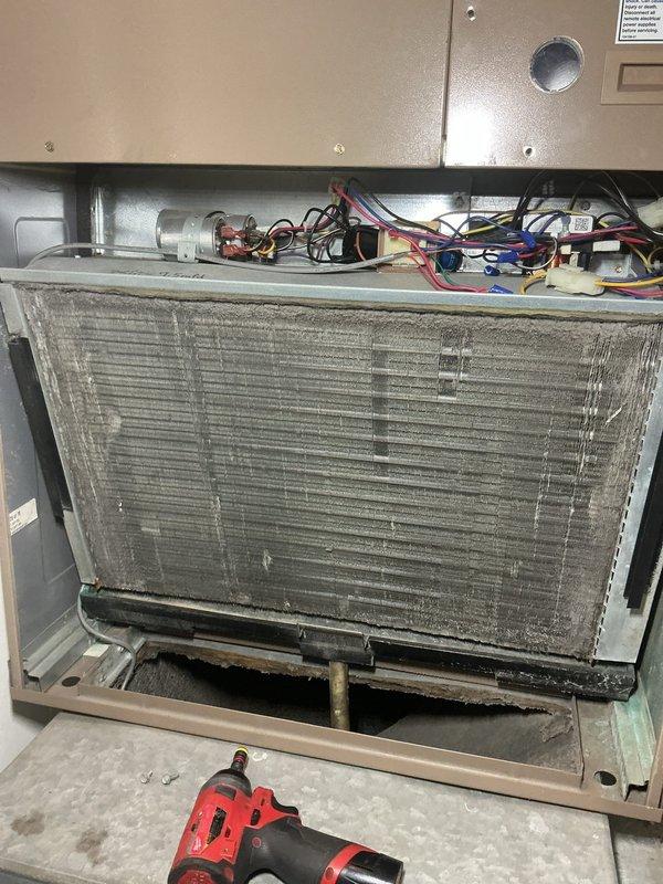 Completed comprehensive cooling maintenance on two MagicPak HVAC units with 16x25x1 filter specification. Inspection revealed significant corrosion on electrical contactor terminals and dust accumulation on evaporator coil fins. Documented equipment condition with photographic evidence showing oxidized relay connections and debris-laden heat exchanger requiring attention during future service intervals.