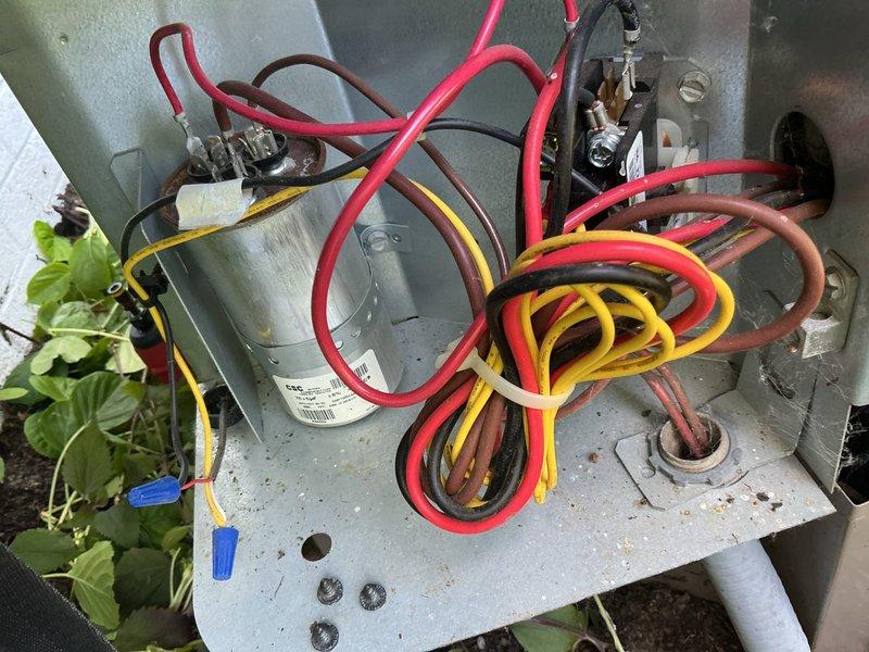 Responded to service call for AC unit making abnormal sound during operation. Upon inspection, found unit running with electrical parameters within acceptable range. Documented compressor amperage at 13.3A and condenser fan motor amperage at 1.0A. Inspected internal electrical components including capacitor, wiring connections, and terminal blocks. All electrical connections found secure with no signs of arcing or damage. Unit operating properly at time of inspection with no unusual sounds detected during run cycle.