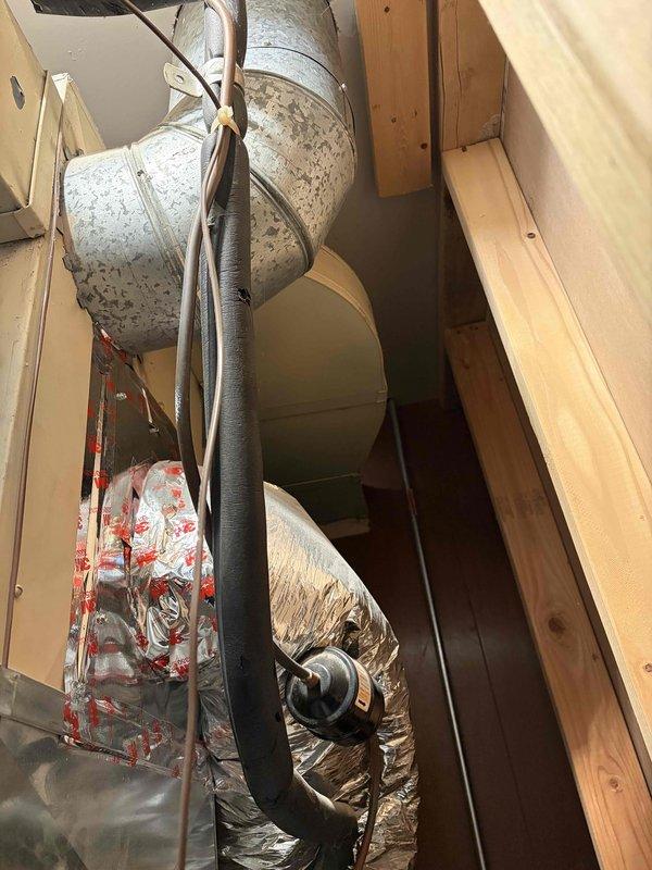 Provided comprehensive estimate for complete air conditioning system replacement including new condenser and evaporator coil. Presented three-tier pricing options featuring Carrier equipment: Good tier with up to 14 SEER, Better tier with up to 17 SEER, and Best tier with up to 19 SEER for improved energy efficiency. Documented existing attic-mounted HVAC system including ductwork configuration, flexible ducting connections, and current installation layout to ensure proper sizing and compatibility for replacement equipment.