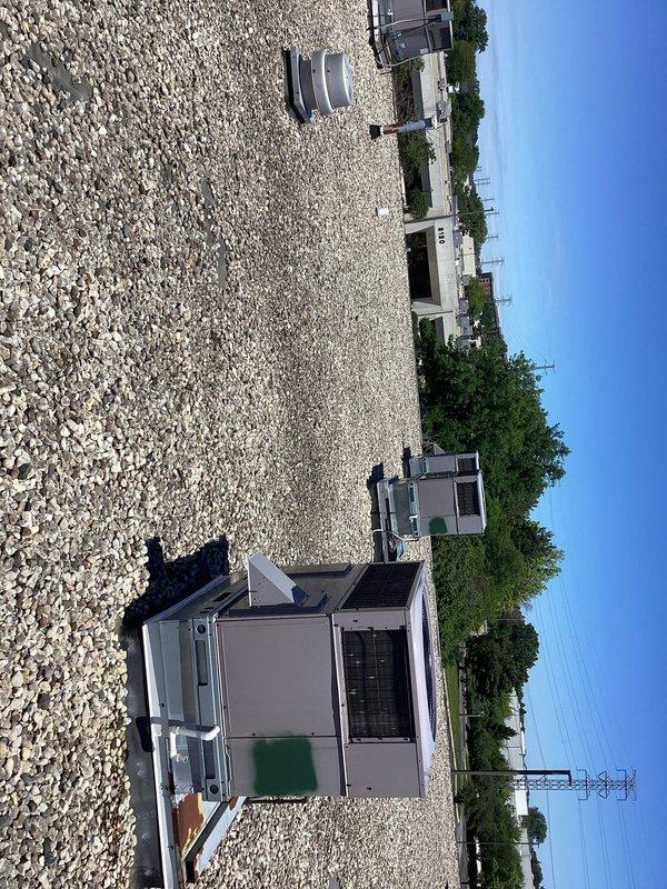 Completed scheduled commercial HVAC maintenance on two remaining rooftop units as part of ongoing service agreement. Performed comprehensive RTU inspections including filter changes, coil cleaning, refrigerant line inspection, and operational testing. Documented frost accumulation on suction lines indicating proper refrigerant flow and system operation during cooling cycle. All units operating within normal parameters upon completion of maintenance procedures.