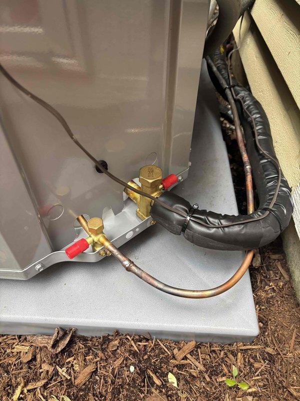 Completed full condenser and evaporator coil replacement on residential A/C system. Installed new outdoor condensing unit with refrigerant line connections, secured unit on composite equipment pad, and replaced indoor evaporator coil. Brazed copper refrigerant lines, performed system evacuation to 258 microns to verify proper vacuum levels and ensure no leaks in the system, then charged unit with refrigerant per manufacturer specifications. Tested all electrical connections, verified proper system operation, and confirmed cooling performance meets design parameters.