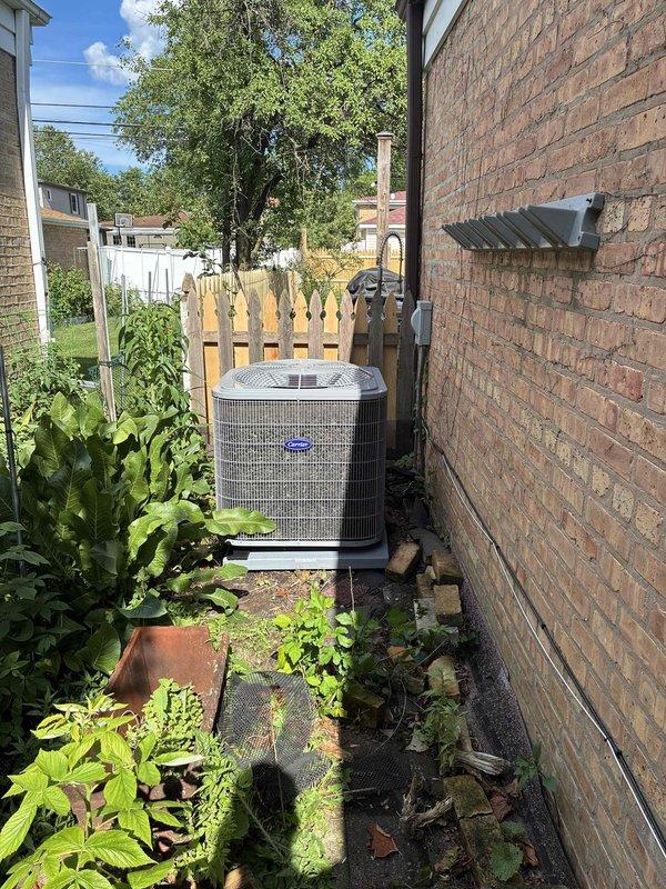 Completed warranty callback to relevel outdoor condensing unit and install proper equipment pad. Upon arrival, verified unit was out of level and sitting on deteriorated concrete pad. Added new composite equipment pad beneath unit, repositioned condenser to ensure proper levelness using precision level across top of unit, and confirmed stable installation. Verified unit operation and left equipment level and properly supported per manufacturer specifications.