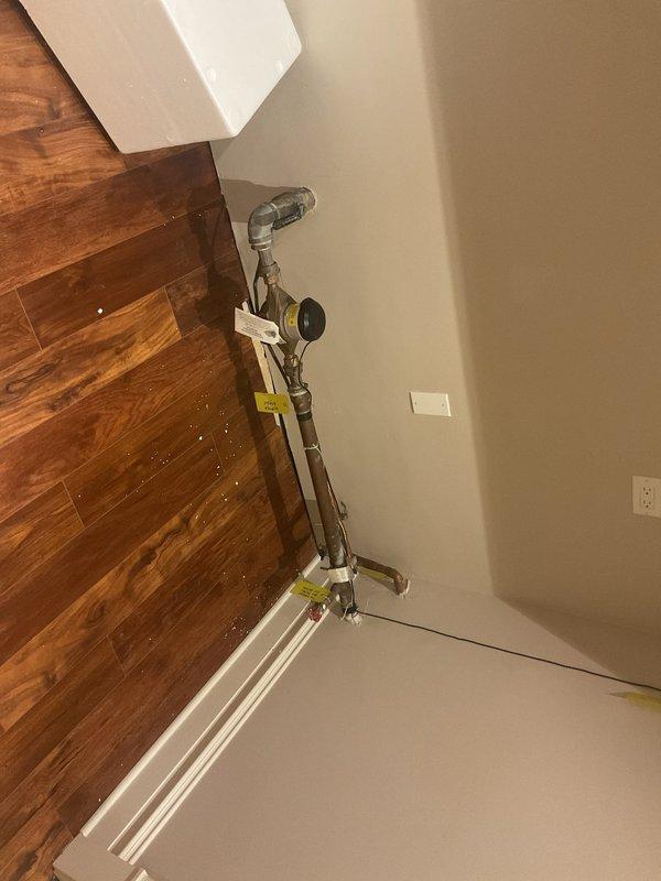 Responded to a leaking tub spout issue in a bathroom with white tile surround and chrome fixtures. Removed the existing stem from the tub spout to obtain proper measurements and specifications for matching replacement parts, which will be picked up and installed to resolve the leak.