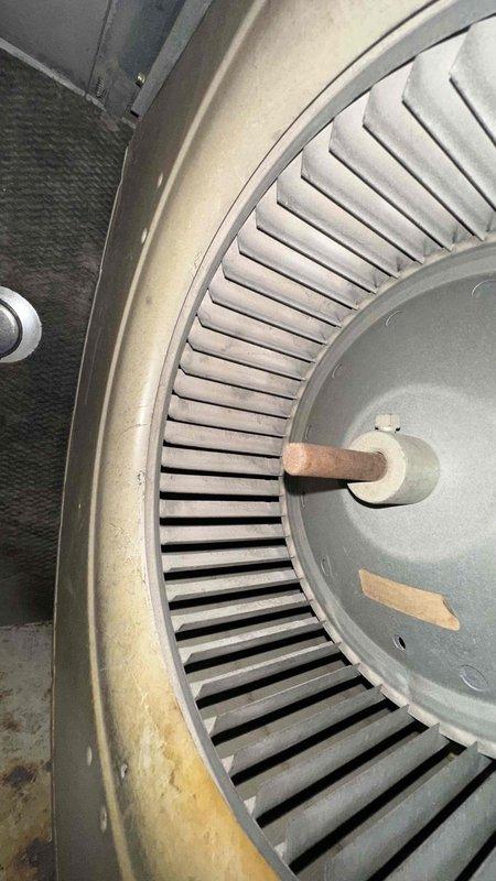 Completed scheduled maintenance agreement covering two air conditioning systems. Performed comprehensive inspection of outdoor condenser unit, noting significant debris accumulation on protective grille and organic growth at base requiring attention. Inspected indoor blower wheel assembly, observing dust buildup on outer rim and general soiling consistent with normal operation, indicating system is due for standard cleaning procedures during next service interval.