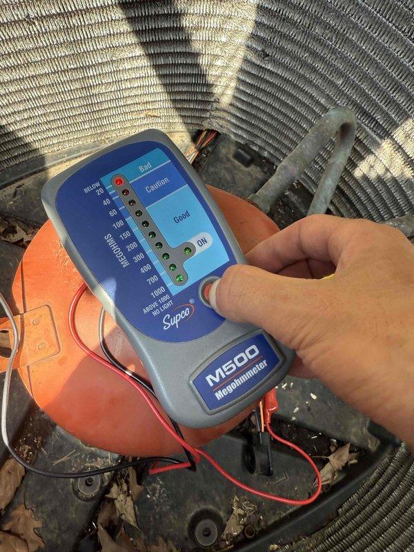 Responded to service call for AC unit repeatedly tripping breaker. Upon arrival, performed comprehensive electrical diagnostics on outdoor condensing unit. Utilized megohmmeter to test compressor windings and insulation resistance, with readings indicating proper electrical integrity in the "Good" range (1000+ megohms). Inspected all electrical connections, capacitors, and contactors within the unit. Verified proper wire terminations at junction block and checked for any signs of electrical shorts or ground faults. All components tested within normal operating parameters with no evidence of electrical failure that would cause breaker tripping.