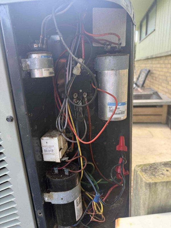 Responded to service call for AC unit repeatedly tripping breaker. Upon arrival, performed comprehensive electrical diagnostics on outdoor condensing unit. Utilized megohmmeter to test compressor windings and insulation resistance, with readings indicating proper electrical integrity in the "Good" range (1000+ megohms). Inspected all electrical connections, capacitors, and contactors within the unit. Verified proper wire terminations at junction block and checked for any signs of electrical shorts or ground faults. All components tested within normal operating parameters with no evidence of electrical failure that would cause breaker tripping.