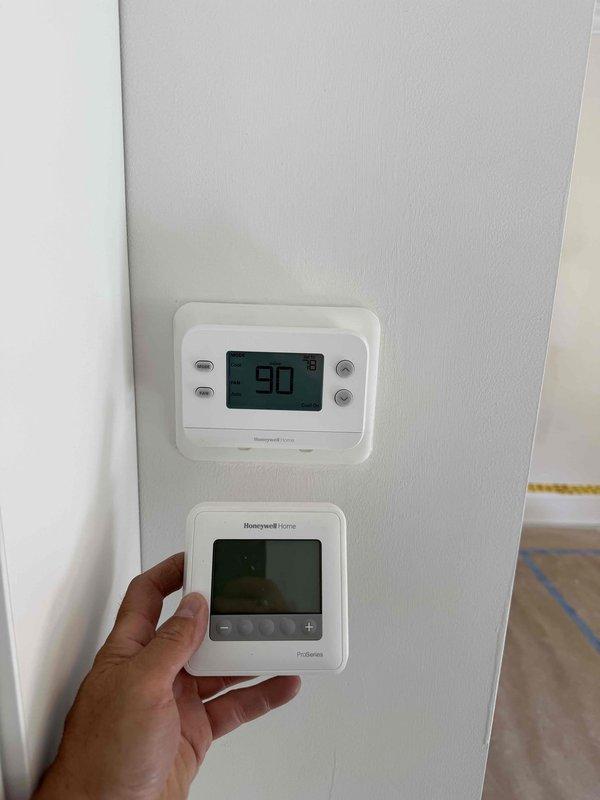Responded to no cooling complaint on residential air conditioning system. Upon inspection, diagnosed and resolved cooling issue with outdoor condensing unit. Discussed thermostat replacement options with customer per request, as existing Honeywell ProSeries unit was not meeting preferences, with customer specifically requesting standard non-smart thermostat installation for future service.