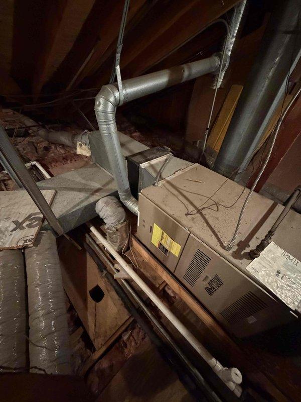 Conducted comprehensive assessment of non-operational air conditioning system affecting entire residence. Evaluated existing HVAC equipment located in attic space, including air handler unit with connected ductwork and distribution system. Documented current system configuration, including flexible and rigid duct connections, equipment placement on attic platform, and overall mechanical installation condition. Examined outdoor condensing unit and verified system age and operational status. Measured access openings and assessed installation parameters for replacement equipment. Provided detailed estimate for complete HVAC system replacement including removal of existing equipment, installation of new air conditioning system, and necessary modifications to ensure proper operation and code compliance.