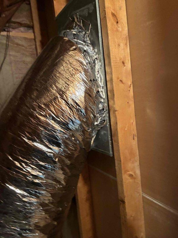 Responded to service call for collapsed 16-inch return ductwork on air handler system. Upon inspection in attic space, identified failed flexible duct section that had compressed and restricted airflow to the air handler unit. Removed damaged ductwork and installed new 16-inch flexible duct with proper support and a 90-degree elbow fitting to ensure proper routing and prevent future collapse. Secured all connections with appropriate clamps and verified adequate airflow restoration to the system.