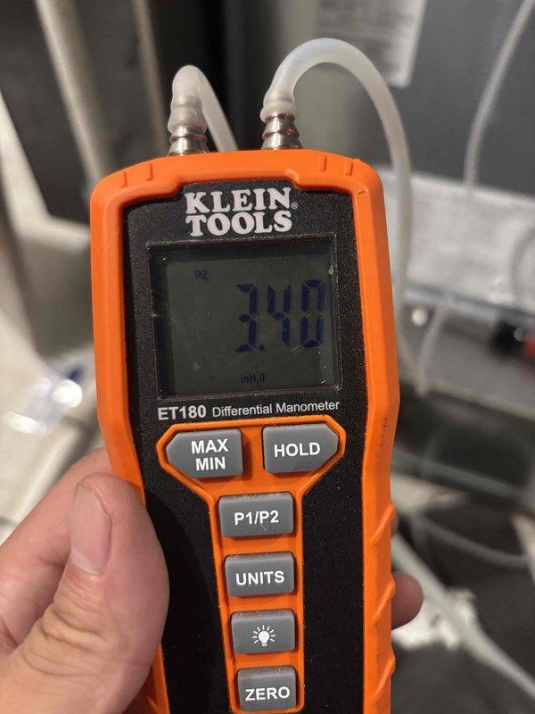 Completed full furnace replacement at residential property with one lead technician and one helper in approximately four hours. Removed existing heating unit and installed new furnace system, ensuring proper connections to existing ductwork and utilities. Performed comprehensive system diagnostics using differential manometer to verify static pressure readings, confirming optimal airflow performance with measurements of 141 inH2O and 346 inH2O at designated test points. System tested and verified operational within manufacturer specifications.
