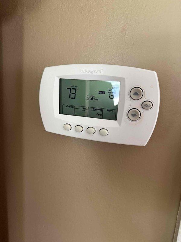 Responded to no cooling complaint on AC unit. Upon arrival, verified thermostat operation and confirmed system functionality by measuring supply air temperature at 56.8°F, indicating proper cooling performance. Educated customer on normal system operation and thermostat programming.