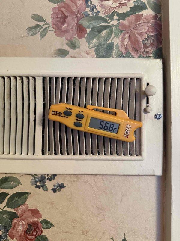 Responded to no cooling complaint on AC unit. Upon arrival, verified thermostat operation and confirmed system functionality by measuring supply air temperature at 56.8°F, indicating proper cooling performance. Educated customer on normal system operation and thermostat programming.