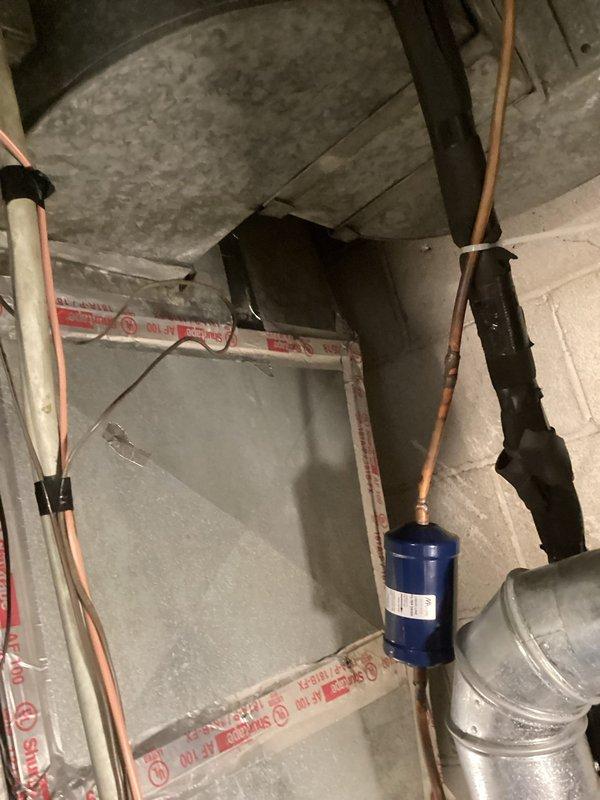 Responded to no cooling complaint on residential air conditioning system. Upon inspection, identified and replaced failed filter-drier in refrigerant line circuit. System restored to proper cooling operation and verified satisfactory performance before departure.