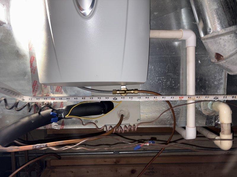 Conducted site assessment for full HVAC system replacement on aging equipment over 10 years old. Documented existing system configuration including air handler, ductwork connections, and associated mechanical components. Measured supply plenum dimensions and photographed current installation setup to determine proper equipment sizing and clearance requirements for new system installation. Previous day's repair work completed, but homeowner requesting comprehensive replacement quote due to system age and condition. Evaluated accessibility, existing infrastructure, and mounting platforms to prepare accurate estimate for complete system changeout.