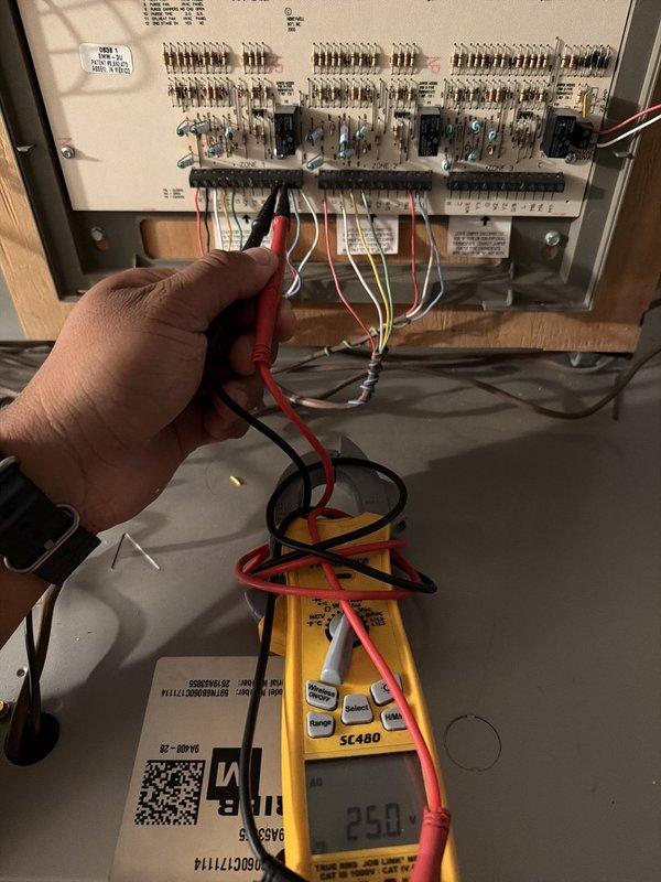 Responded to urgent no-cooling call on 2-year-old AC system with 16 occupants in residence. Performed electrical diagnostics at control panel, measuring 250V supply voltage with multimeter to verify power delivery to system. Tested static pressure readings at supply plenum, recording 128 Pa to assess airflow and system operation, successfully restoring cooling functionality to unit.