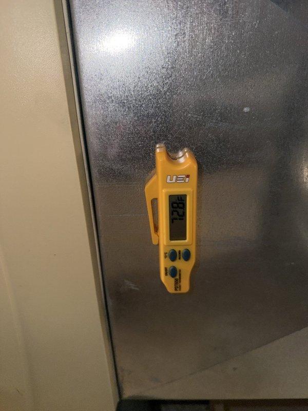 Responded to urgent no-cooling call on 2-year-old AC system with 16 occupants in residence. Performed electrical diagnostics at control panel, measuring 250V supply voltage with multimeter to verify power delivery to system. Tested static pressure readings at supply plenum, recording 128 Pa to assess airflow and system operation, successfully restoring cooling functionality to unit.
