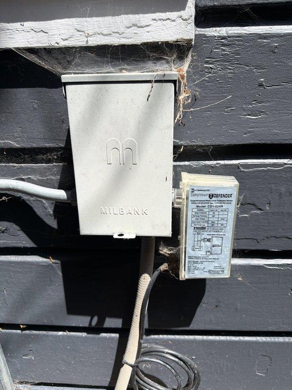 Responded to no cooling complaint on main floor air conditioning unit. Upon arrival, performed diagnostic inspection of outdoor condenser unit and associated electrical components. Unit appeared operational with no obvious mechanical failures observed during visual inspection. Documented equipment condition including exterior disconnect box and unit placement for service records.