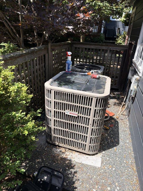Responded to no cooling complaint on main floor air conditioning unit. Upon arrival, performed diagnostic inspection of outdoor condenser unit and associated electrical components. Unit appeared operational with no obvious mechanical failures observed during visual inspection. Documented equipment condition including exterior disconnect box and unit placement for service records.