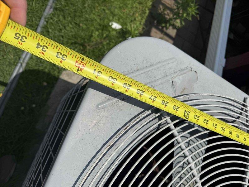 Performed comprehensive assessment of failed outdoor condensing unit for full system replacement. Documented existing equipment dimensions and specifications, measuring 50-60 inch diameter fan assembly on weathered exterior unit with accessible ground-level placement. Evaluated indoor air handler components and ductwork configuration, taking measurements of existing insulated refrigerant lines and mechanical connections in crawl space area. Provided detailed estimate for complete HVAC system replacement including new outdoor condensing unit, indoor air handler, refrigerant line set, and associated electrical connections to restore cooling capacity.