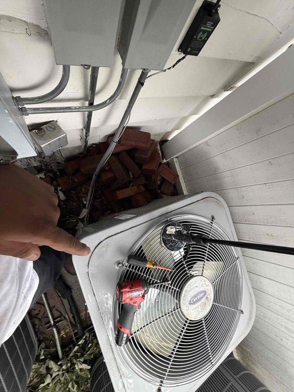 Responded to callback for AC unit not cooling after recent service. Upon inspection, found faulty run capacitor in condensing unit control panel. Replaced defective capacitor, verified proper electrical connections at terminal block, and tested system operation. Unit now cooling properly with normal amperage draw and temperature differential.