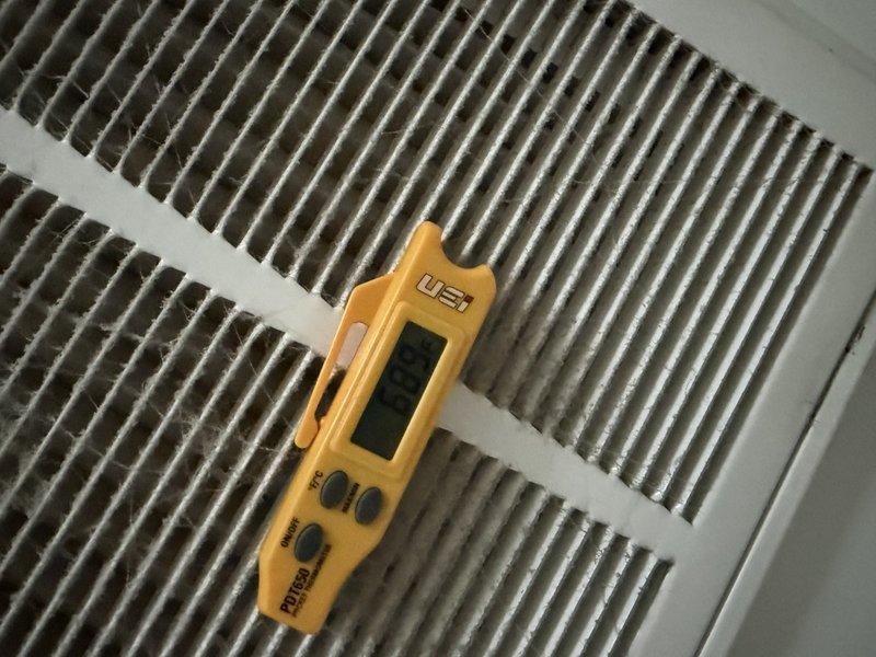 Responded to third callback for recently installed AC unit not cooling properly. Performed diagnostic testing using infrared thermometer to measure supply air temperature at ceiling register, which indicated inadequate cooling performance. Inspected and evaluated return air filter condition and airflow measurements across the system. Documented equipment readings and filter assembly for quality assurance and warranty purposes.